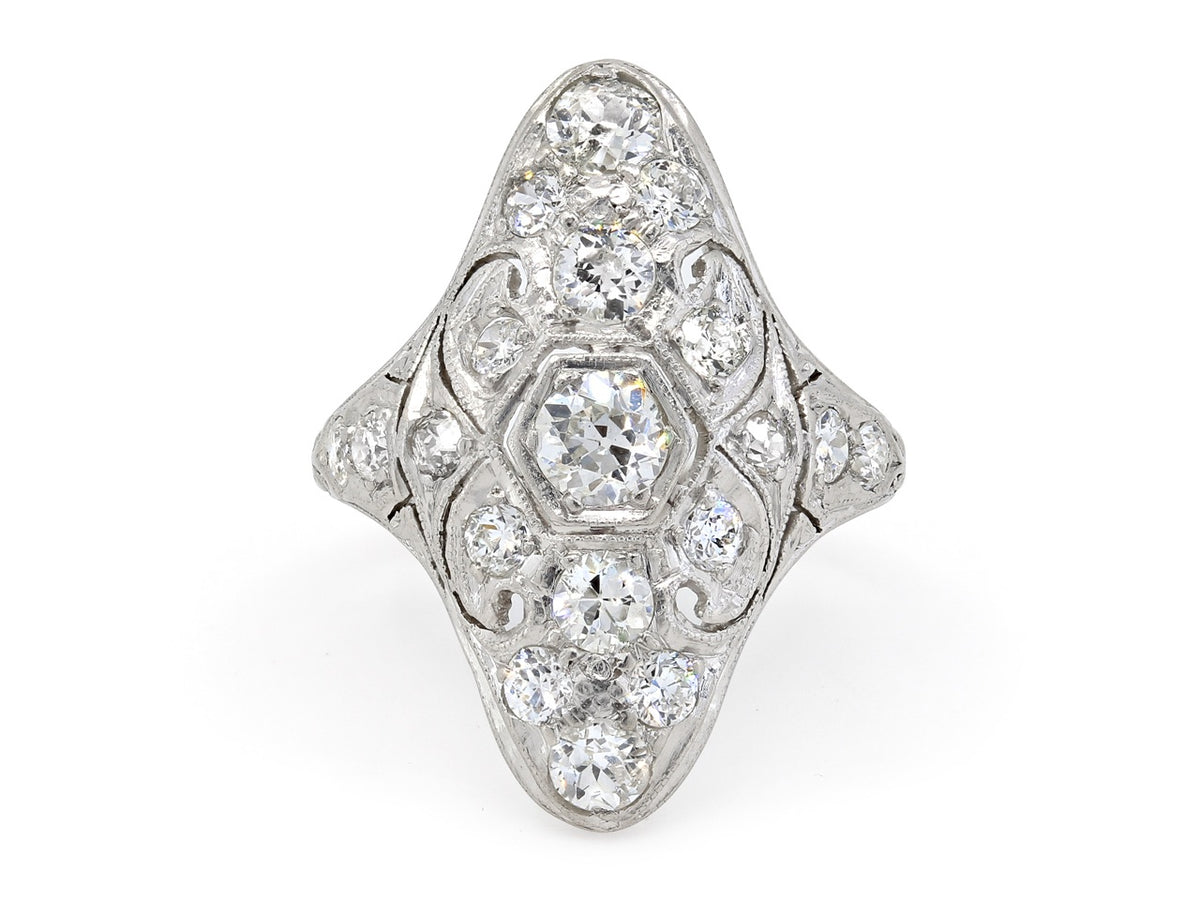 Antique platinum filigree ring with old cut diamonds