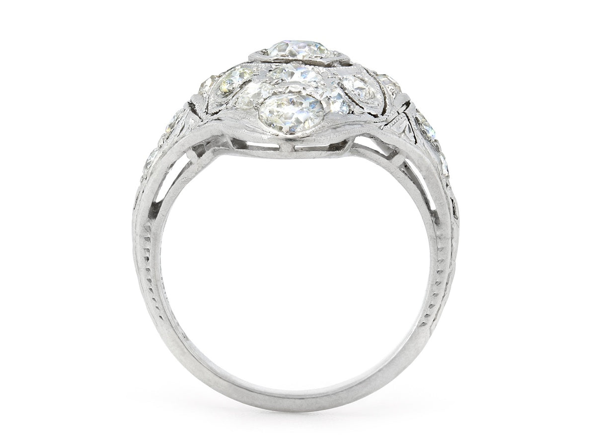 Side view of antique platinum diamond filigree ring