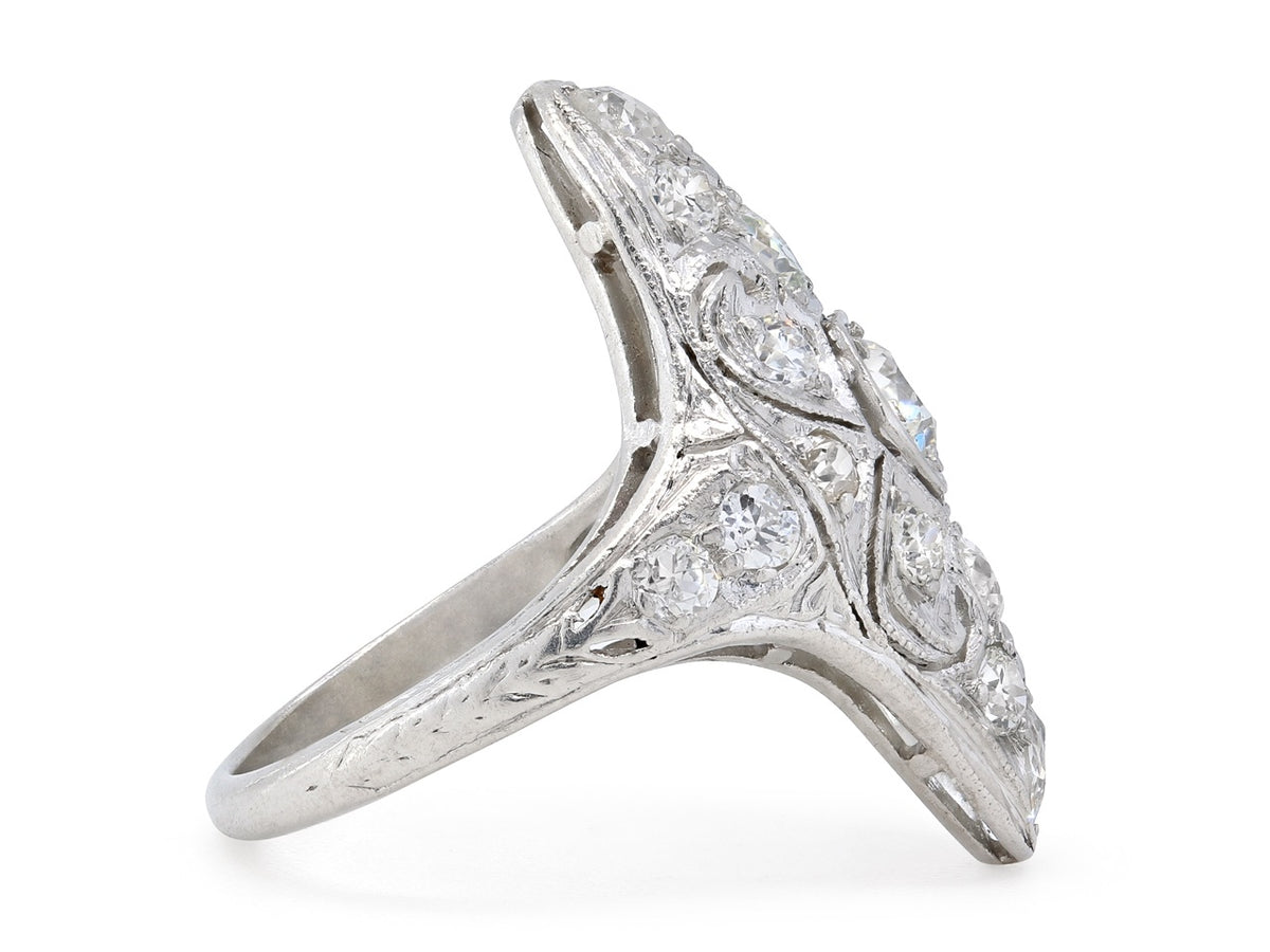 Side view of antique platinum filigree diamond ring