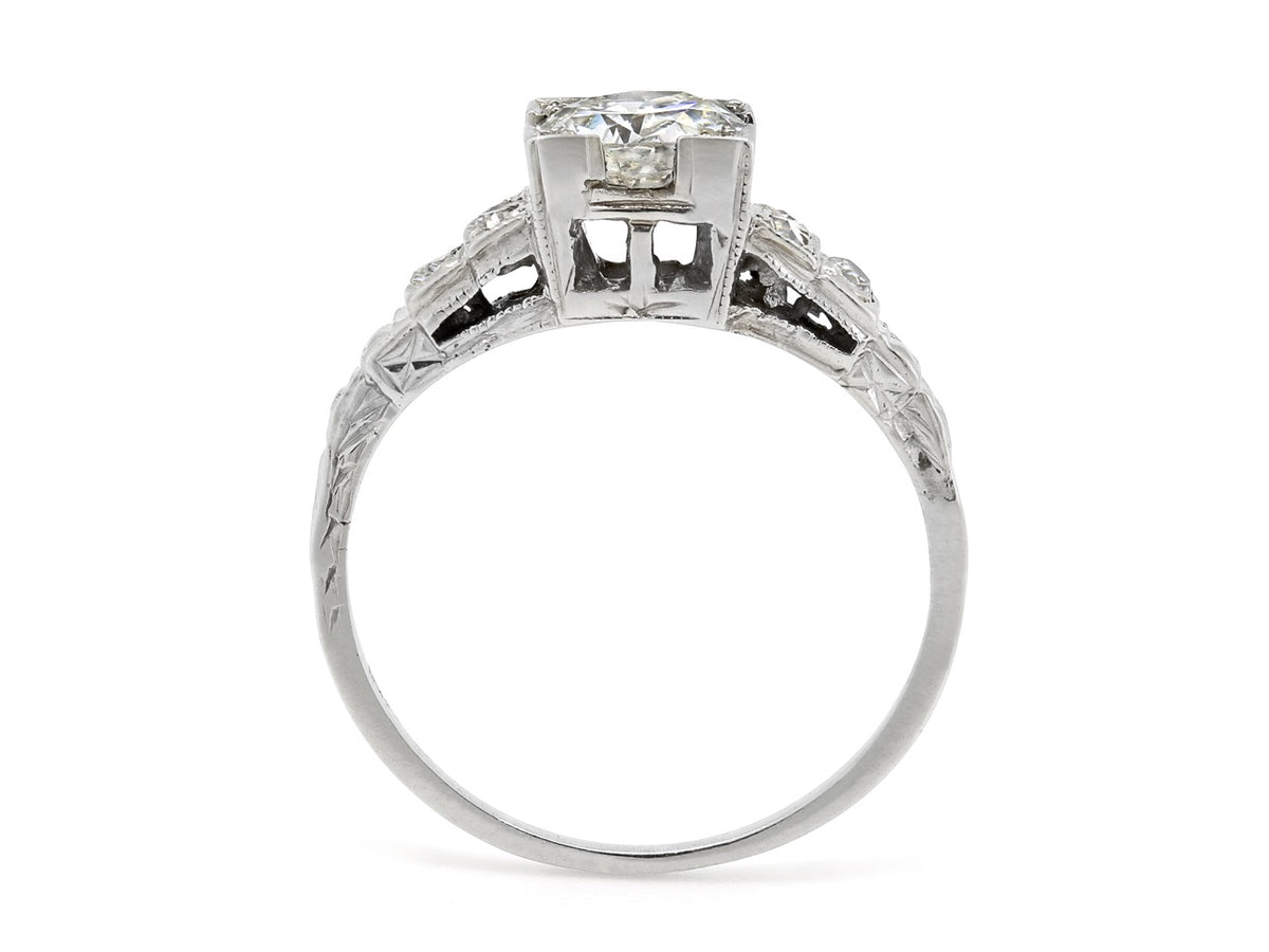 Side view of an antique Edwardian diamond ring in white gold