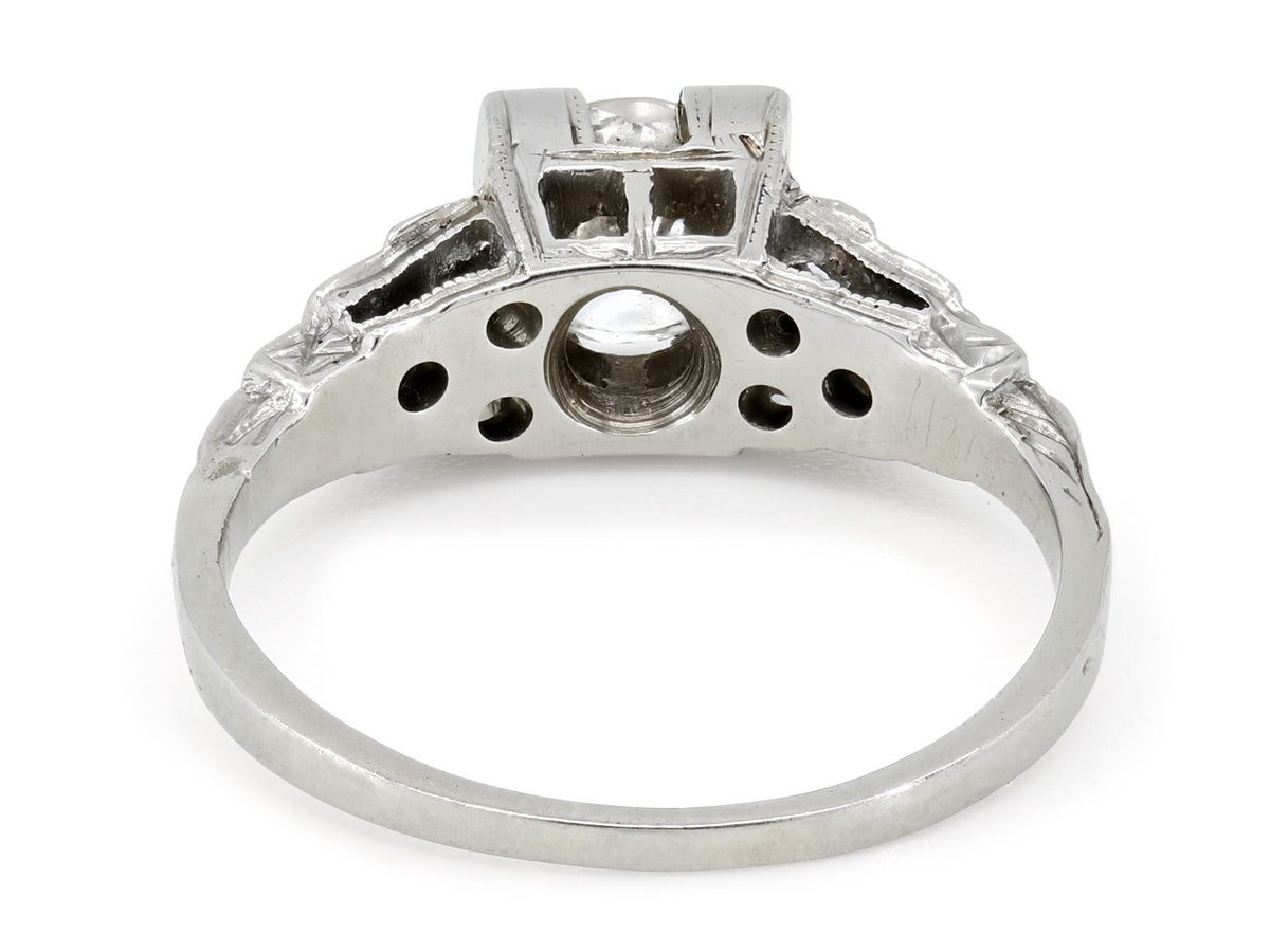 Rear view of an 18K white gold diamond ring with openwork gallery