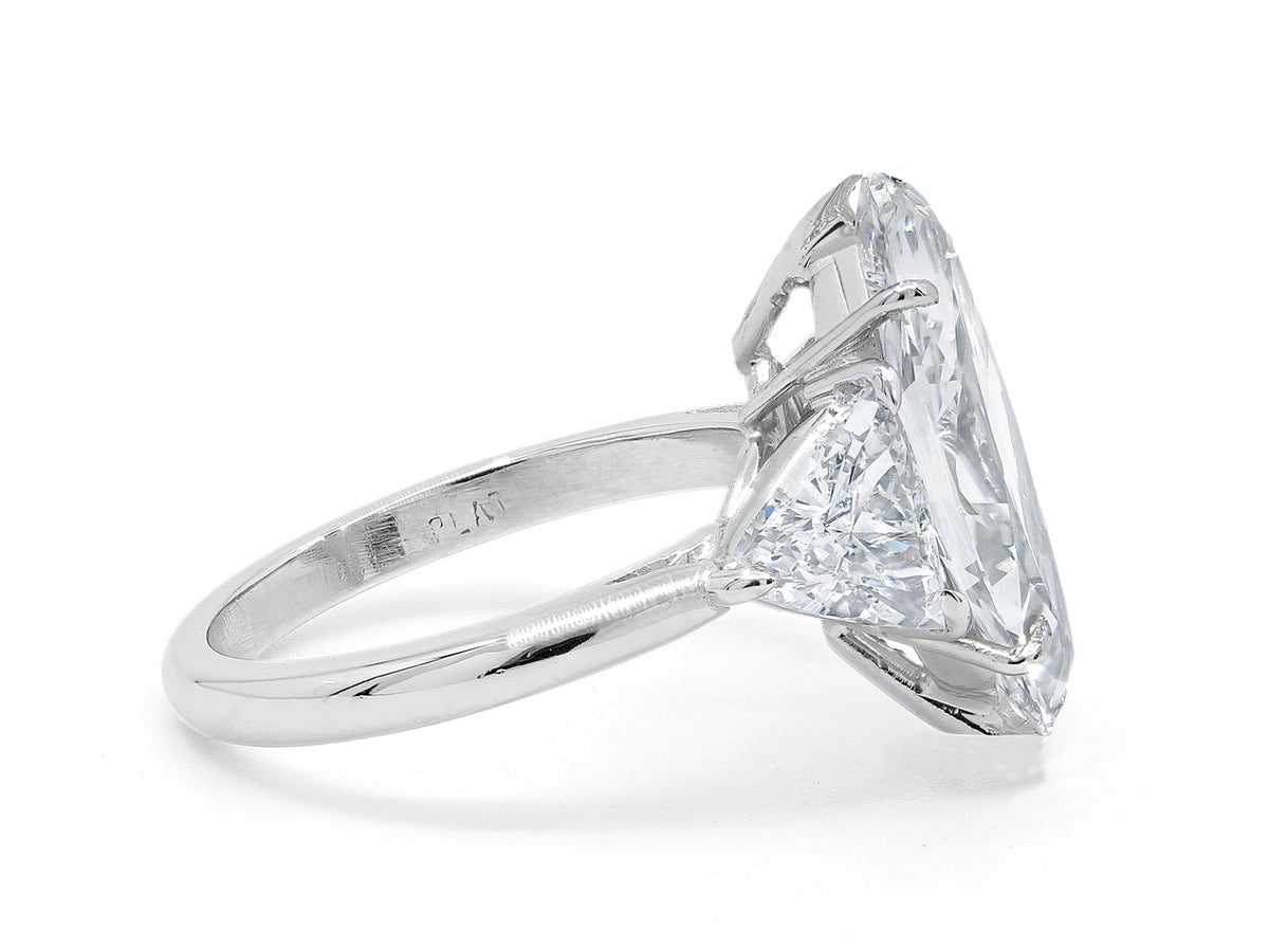 Side view of platinum marquise diamond ring with trillion shoulders