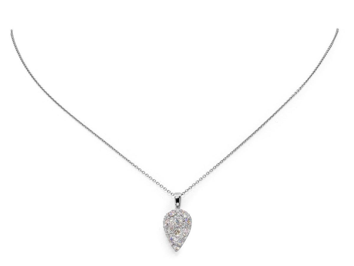 Platinum teardrop diamond pendant necklace on white background