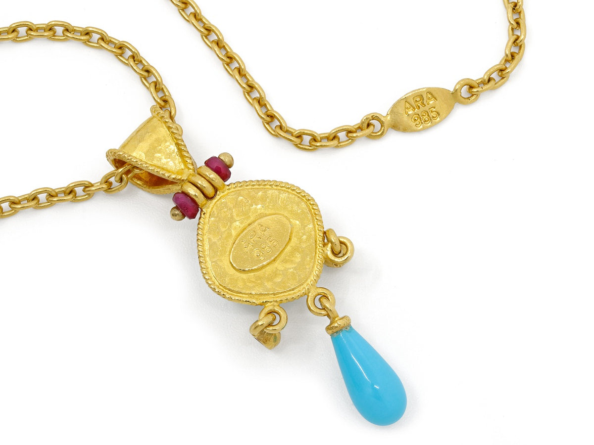 Gold necklace with turquoise drop pendant
