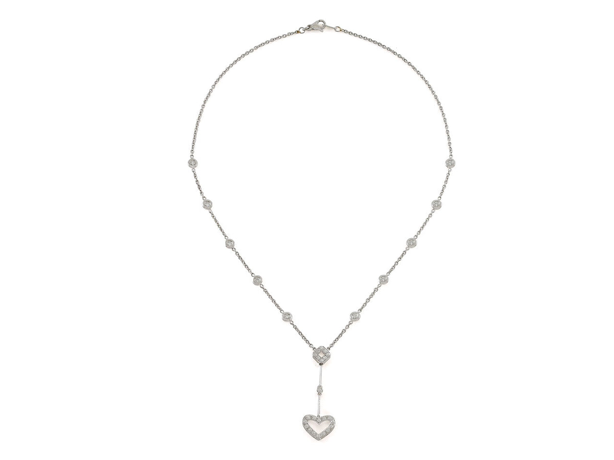 Platinum diamond necklace with heart pendant