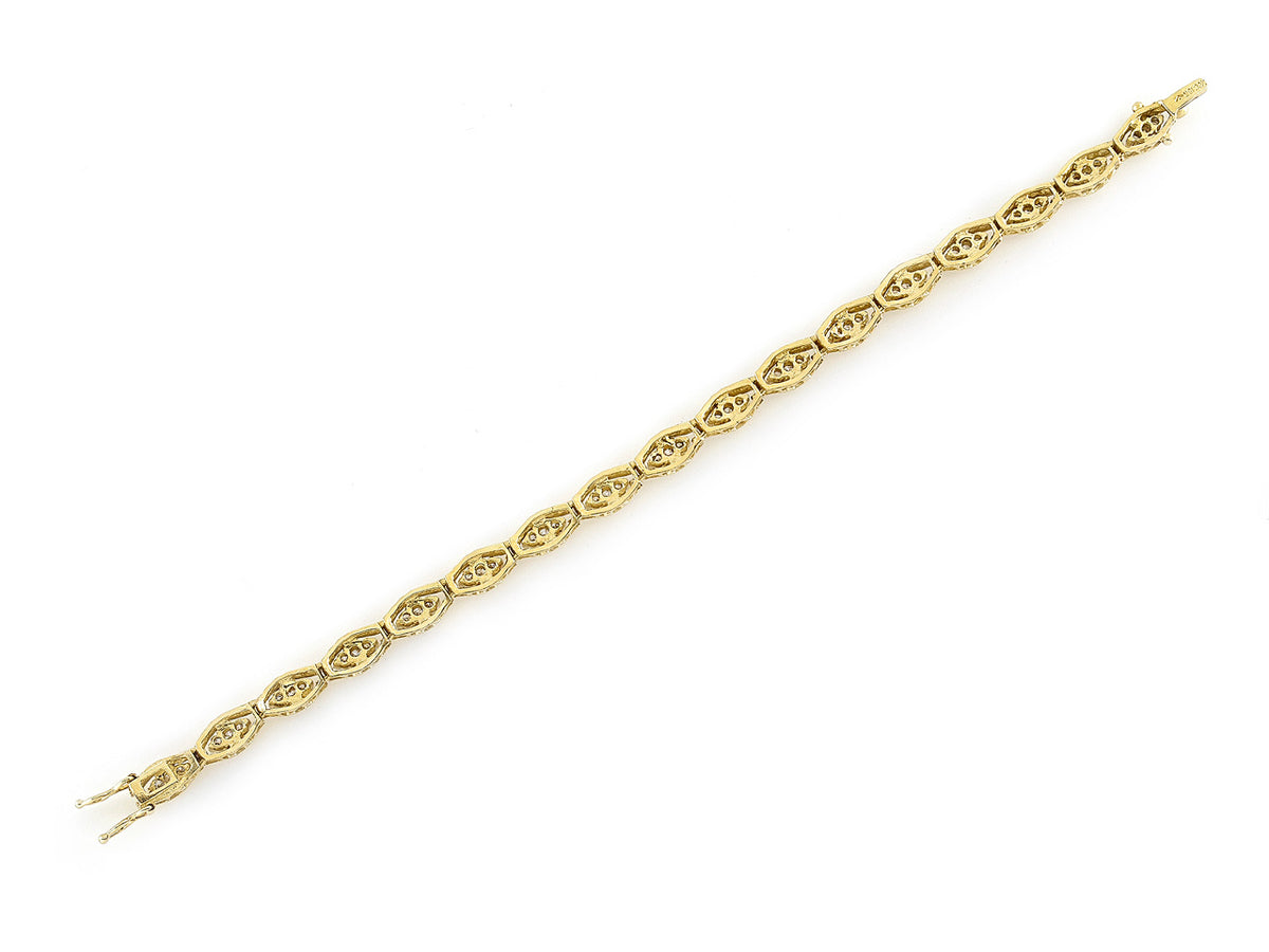18K gold diamond bracelet with open navette links