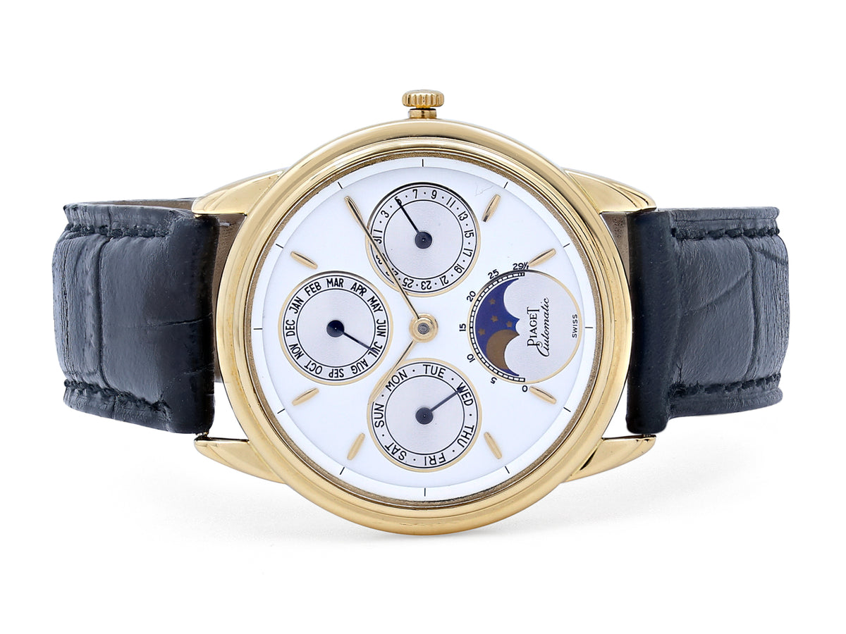 Piaget gold triple calendar watch with moon phase dial