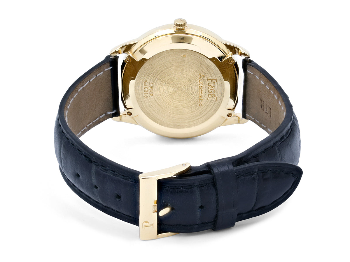 Piaget 18K gold watch case with black leather strap and buckle