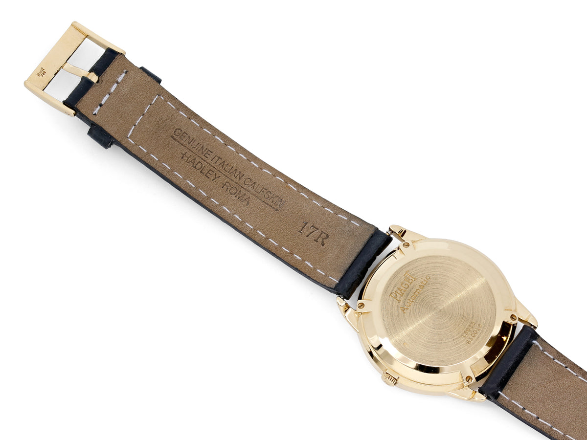 Back view of Piaget gold watch with leather strap