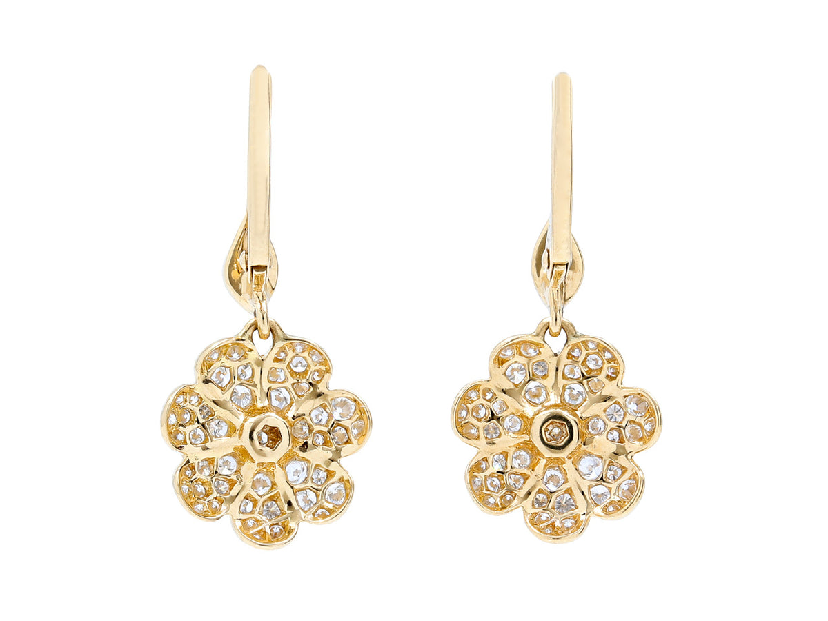 18K gold flower earrings with pavé diamonds and green centers