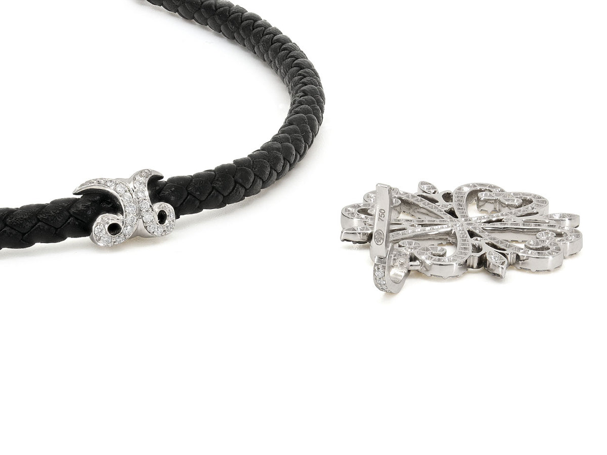 White gold diamond pendant with black braided cord