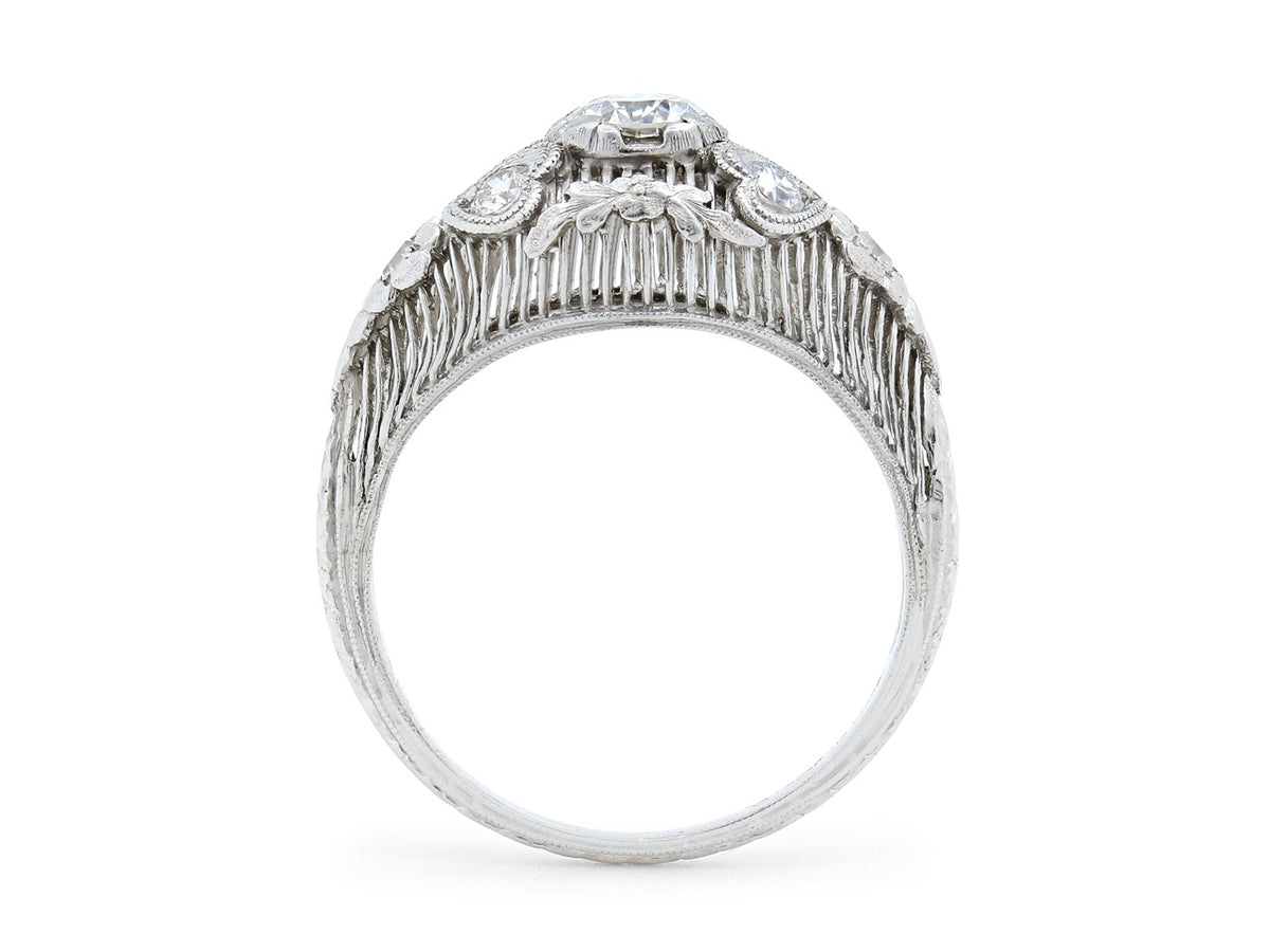 Platinum diamond ring side view with ornate openwork gallery