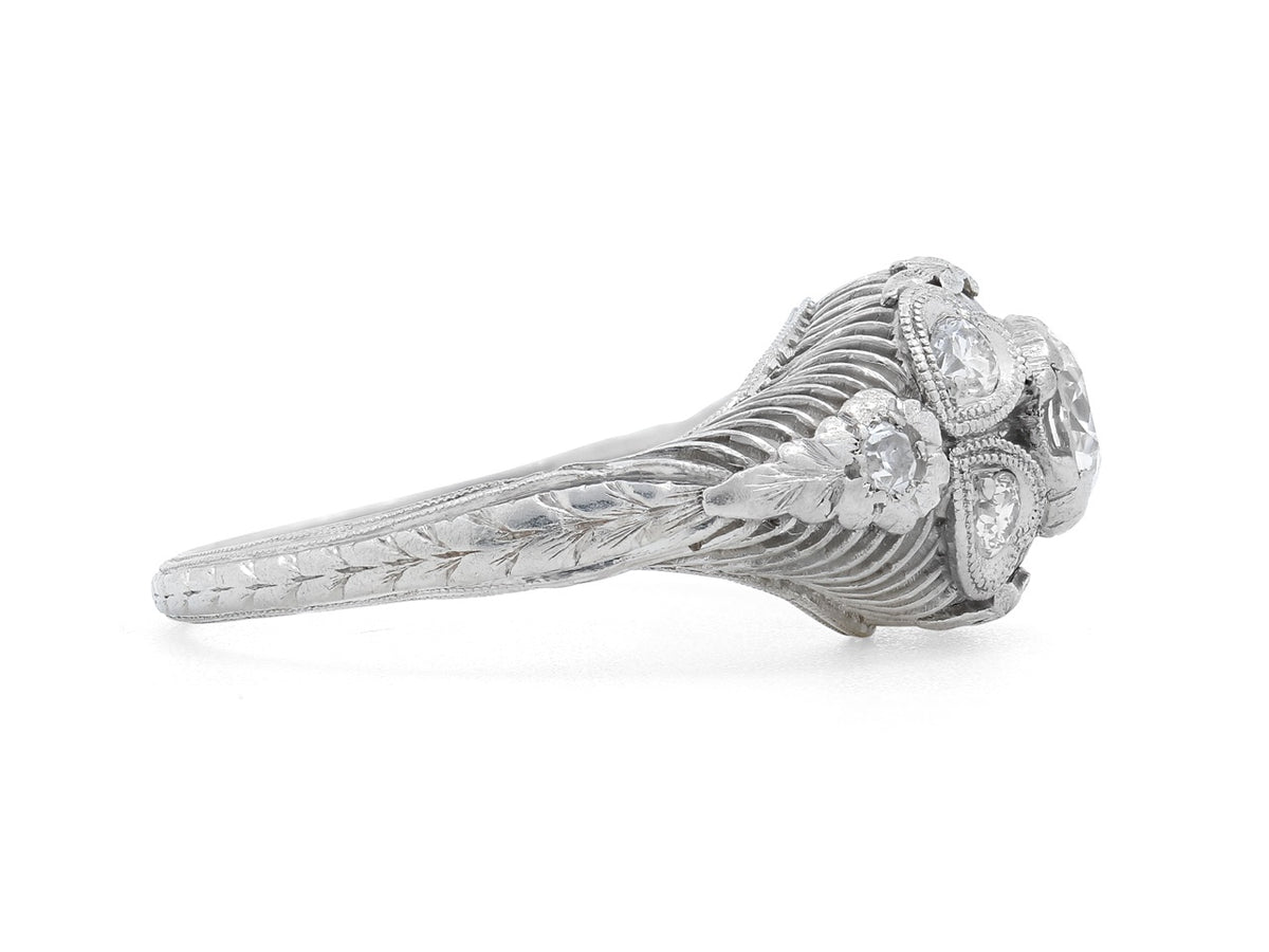 Side view of an ornate platinum diamond ring