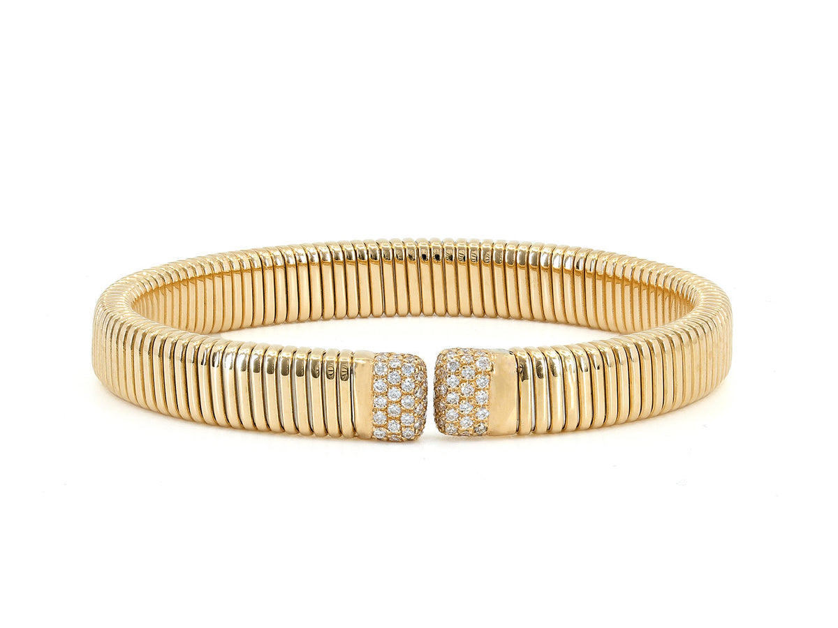 18K gold tubogas bracelet with diamond terminals