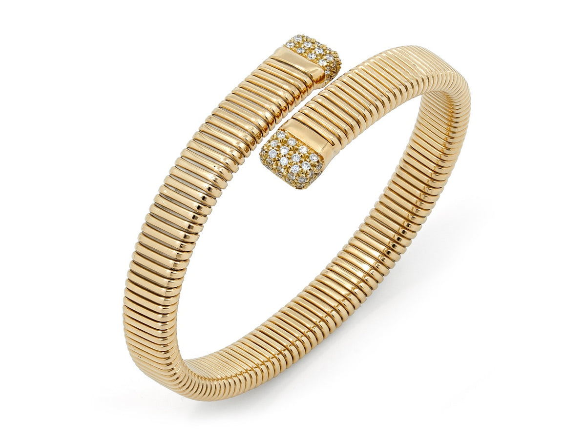 18K gold tubogas bypass bracelet with diamond terminals