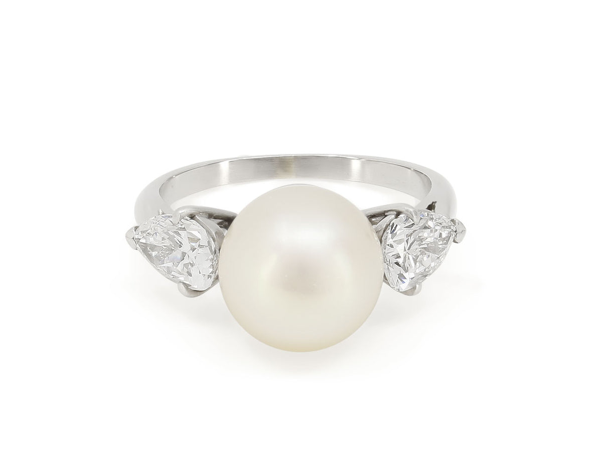Platinum ring with Akoya pearl and pear diamonds