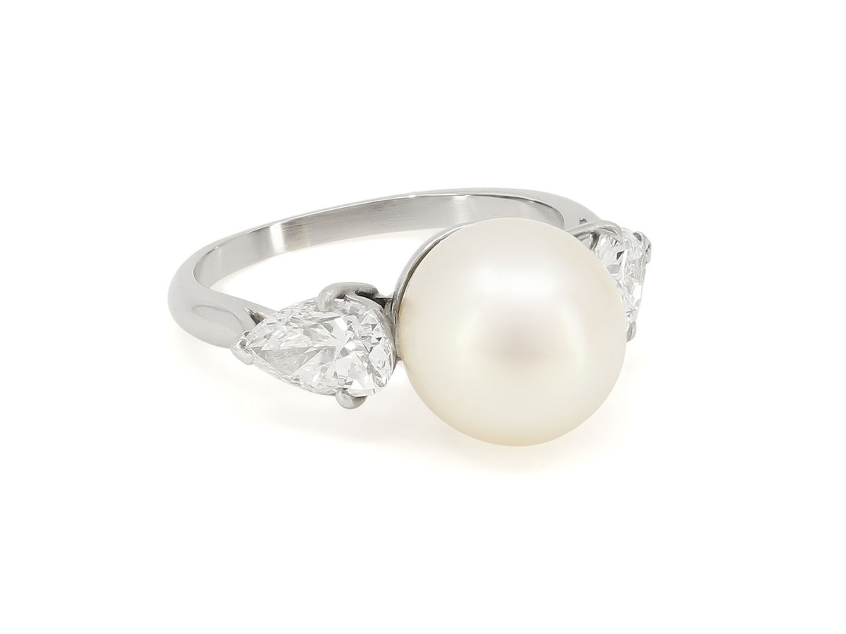 Platinum ring with Akoya pearl and pear shape diamonds