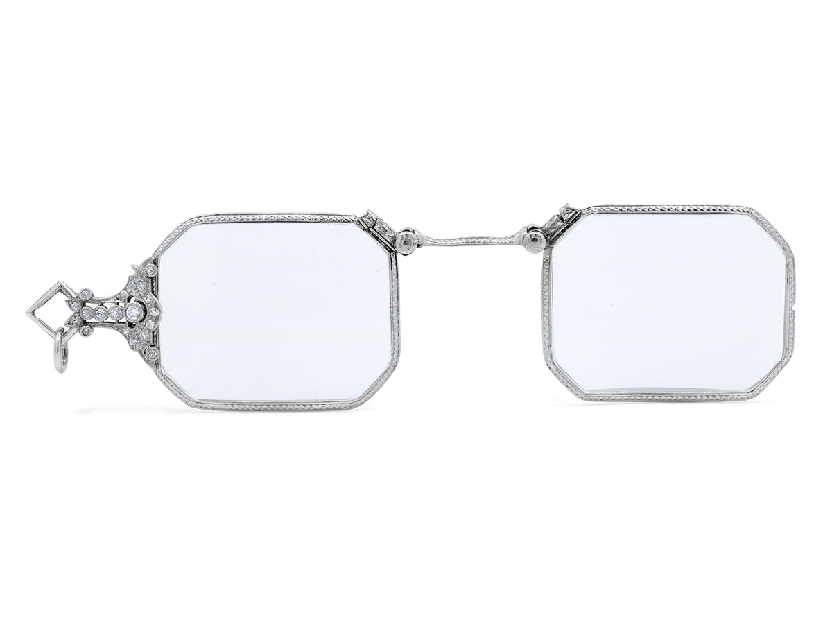 Open platinum lorgnette with octagonal lenses and diamond set handle