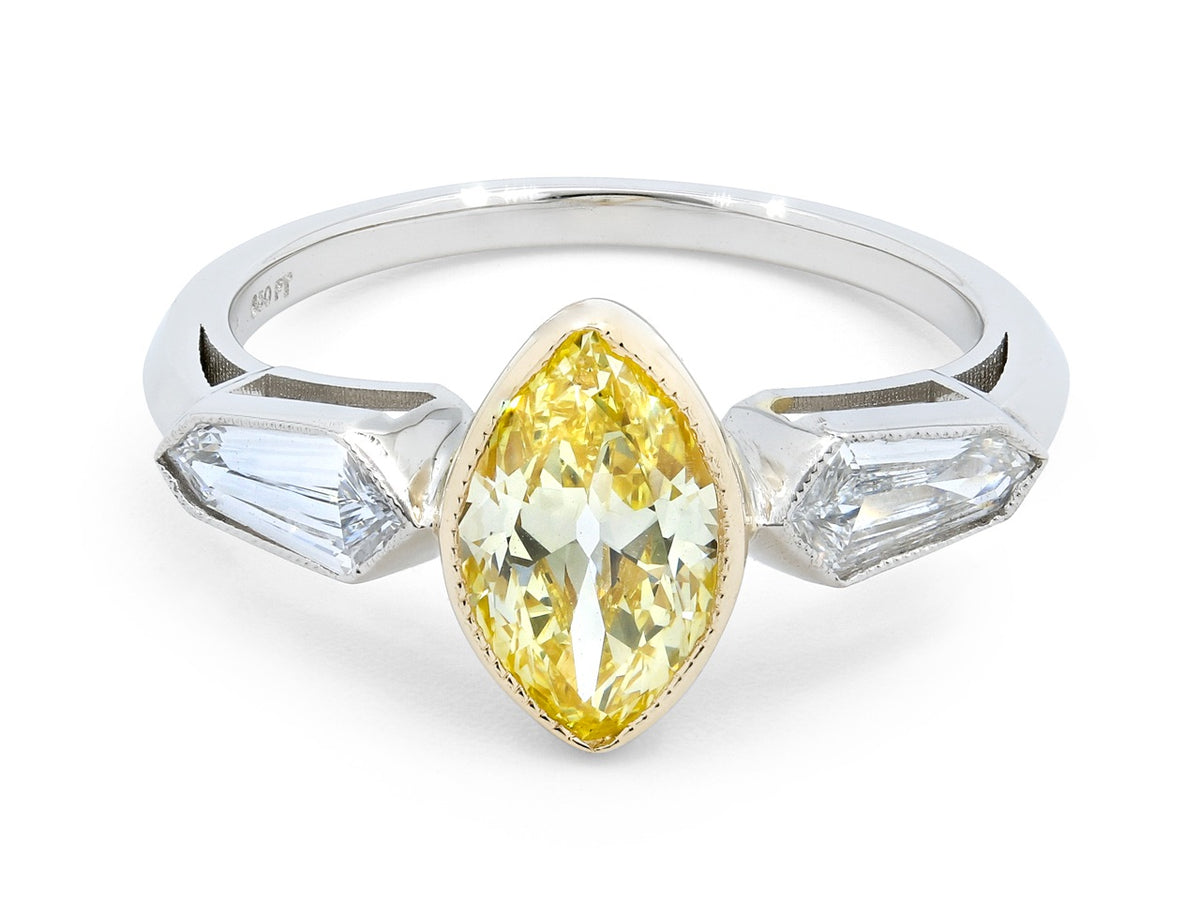 Marquise yellow diamond ring with kite shaped side diamonds