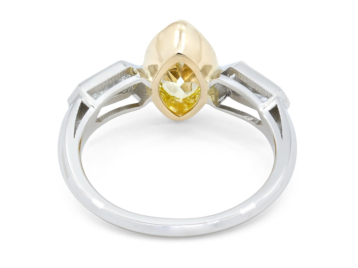 Rear view of platinum ring with yellow gold bezel