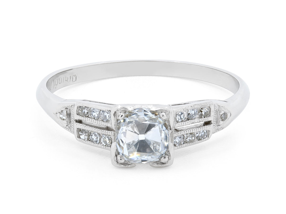 Platinum Art Deco ring with old mine diamond and millegrain shoulders