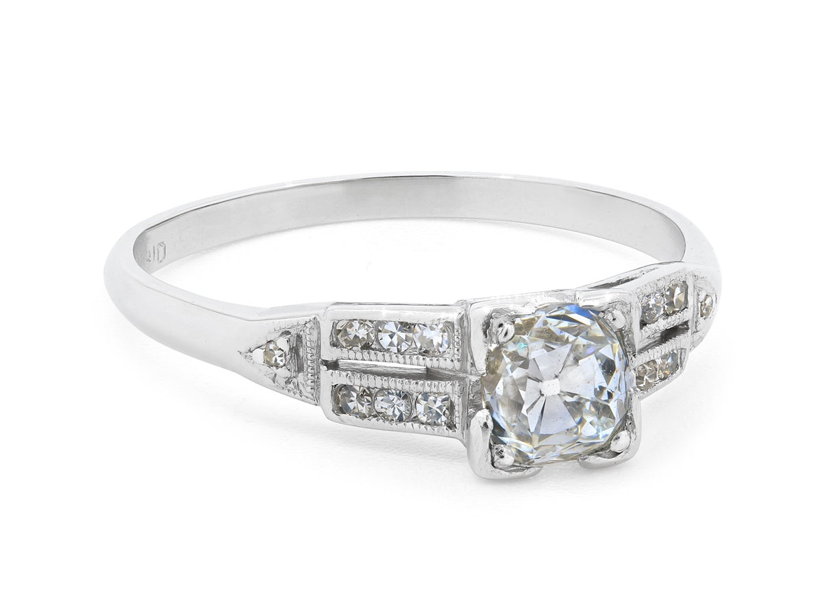 Art Deco platinum ring with old mine diamond and side accents