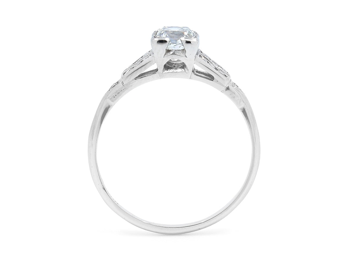 Side view of platinum ring with raised diamond setting