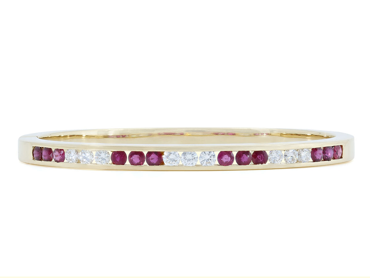 18K gold bangle with alternating ruby and diamond trios