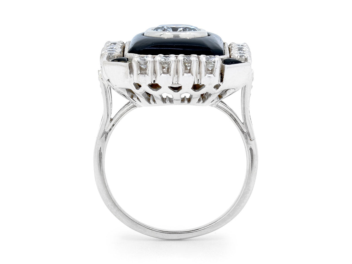 Side view of white gold ring with black onyx and diamonds