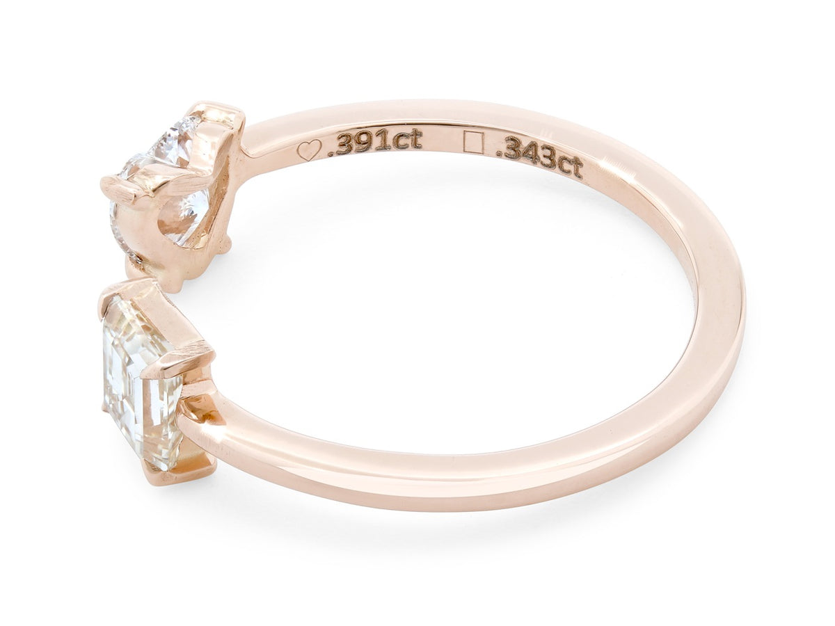 Open rose gold ring with heart and step cut diamonds