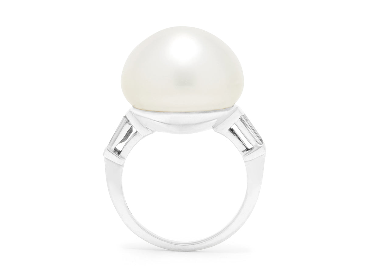 South Sea button pearl ring with baguette diamond shoulders