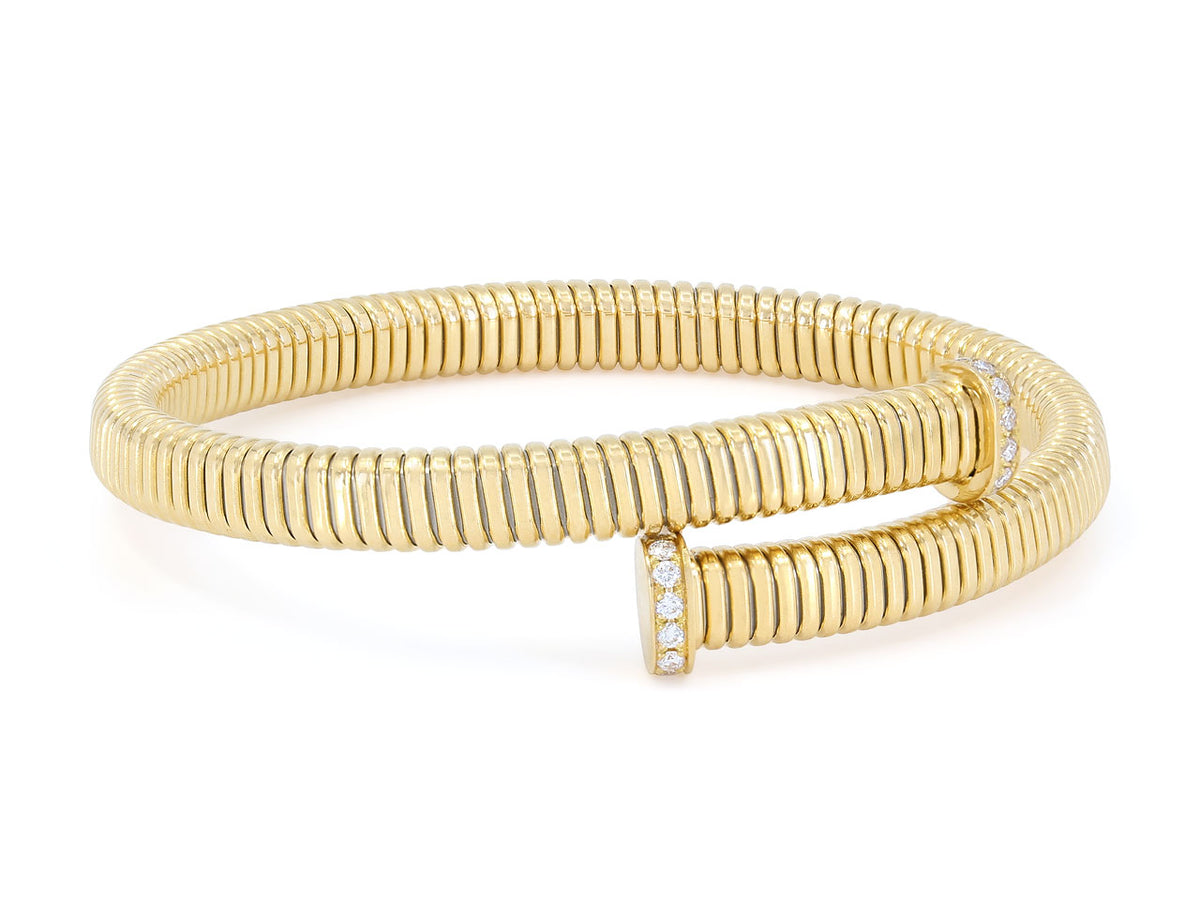 18K yellow gold tubogas bypass bracelet with diamond nail head terminals