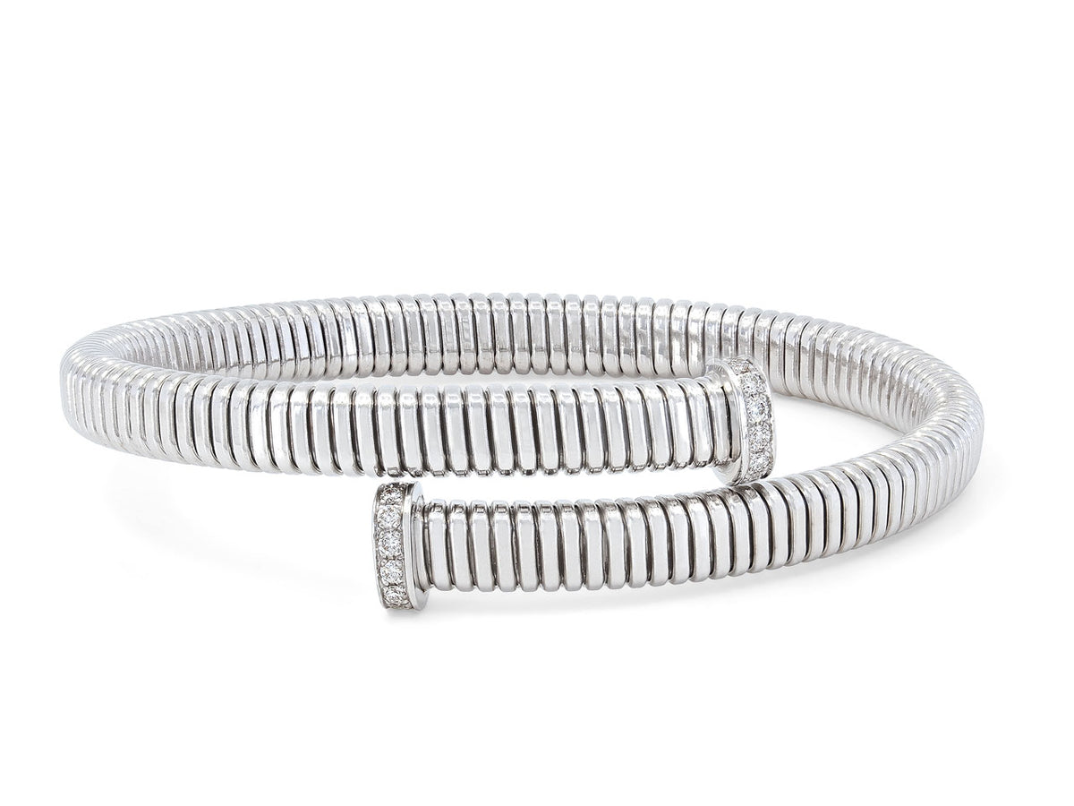 18K white gold tubogas bypass bracelet with diamond terminals