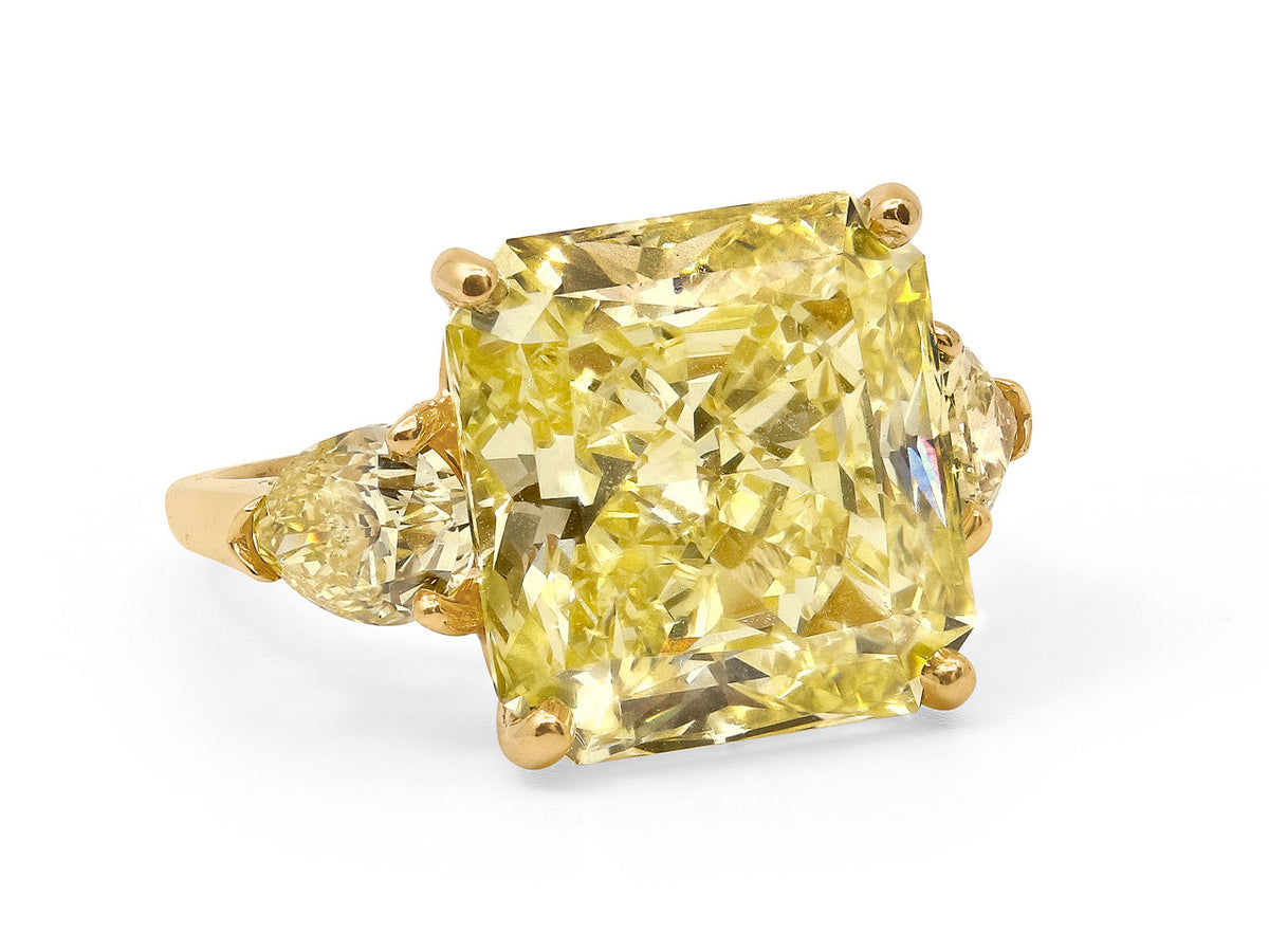 Radiant cut yellow diamond ring in 18k gold