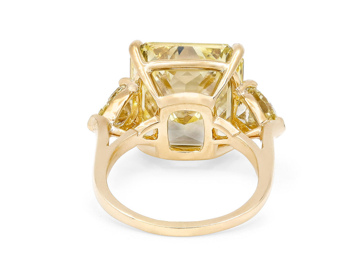 Rear view of an 18k gold ring with open diamond setting