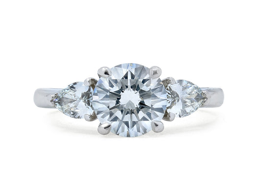 Diamond Solitaire Ring, 1.42 carat H/SI-1 with Pear-shape Diamond Shoulders, in Platinum