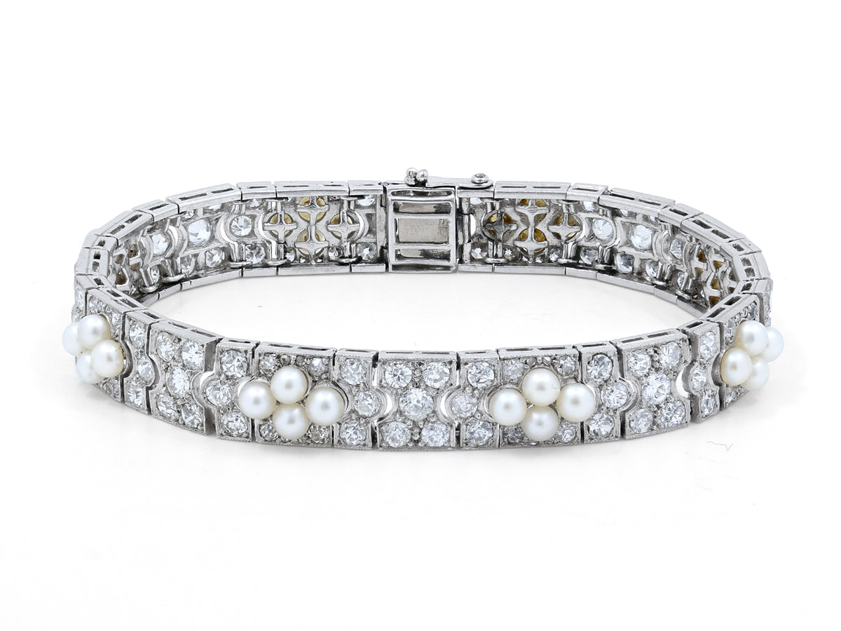 Platinum bracelet with diamond links and natural pearls