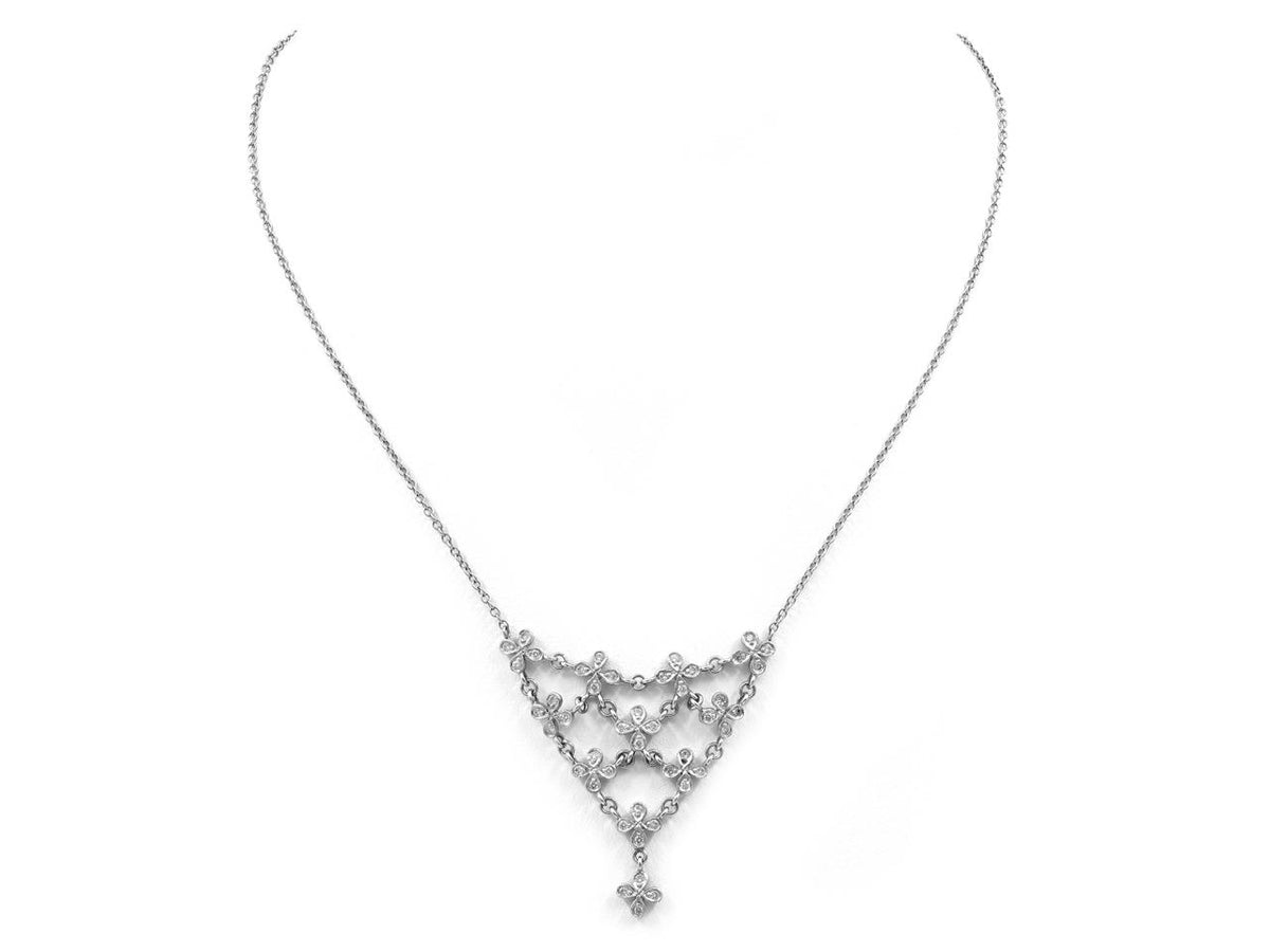 Platinum diamond petal necklace with triangular pendant