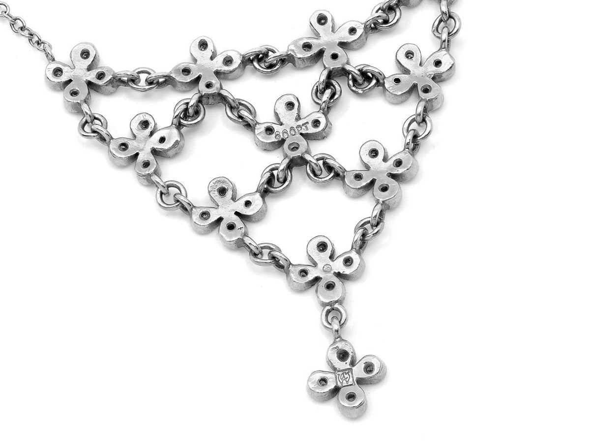 Platinum diamond petal necklace with floral pendant