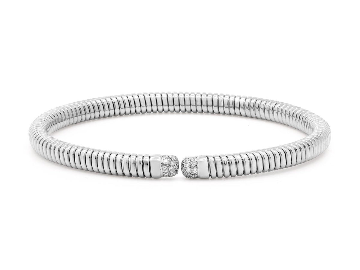 White gold tubogas bangle with diamond set terminals