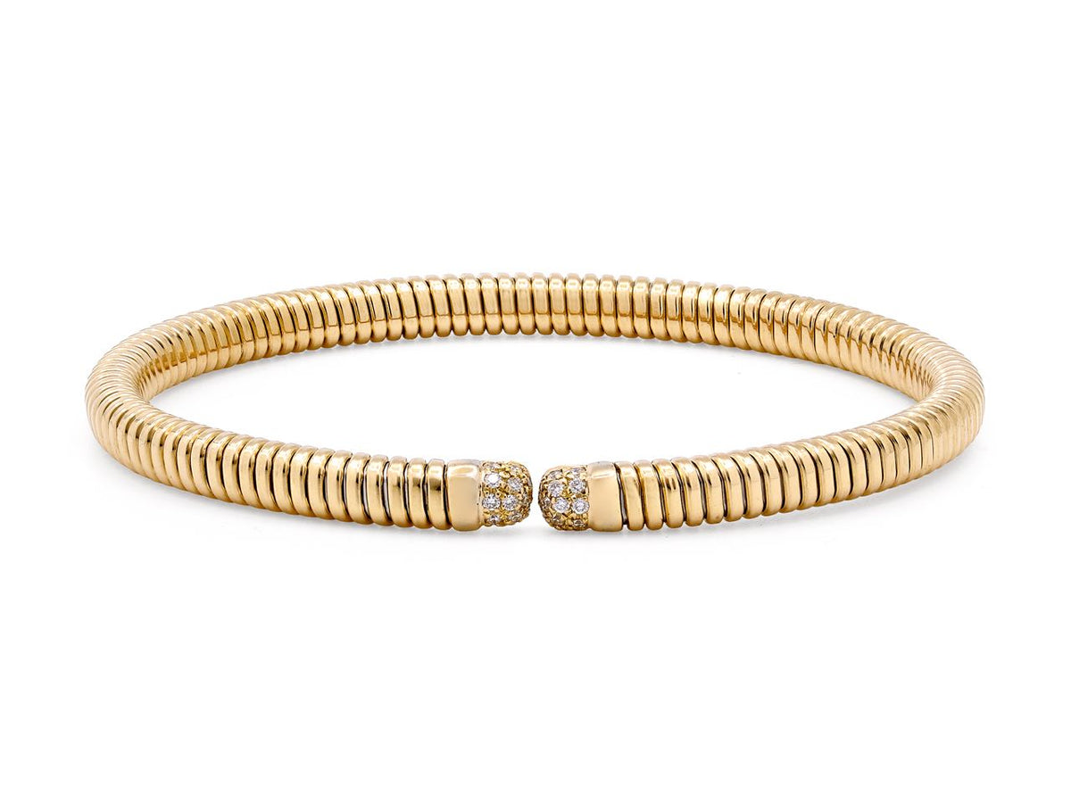 18K yellow gold tubogas bangle with diamond terminals