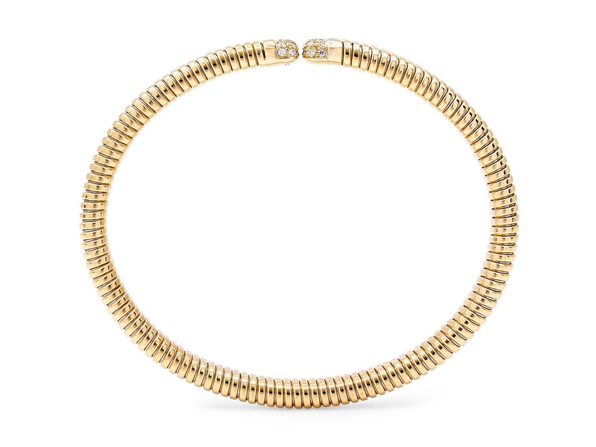18K yellow gold tubogas bracelet with diamond terminals