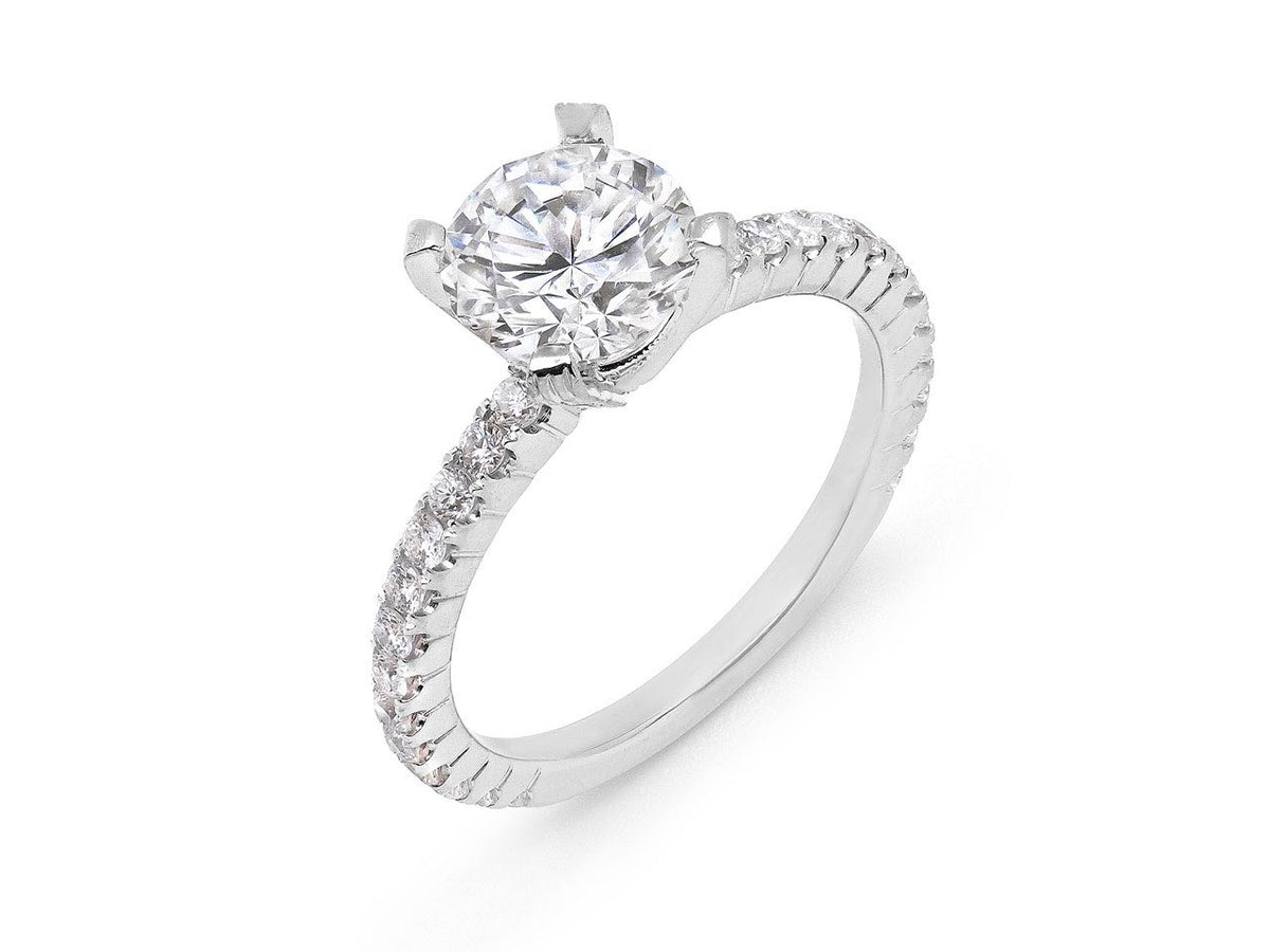 Round diamond ring with pave white gold band