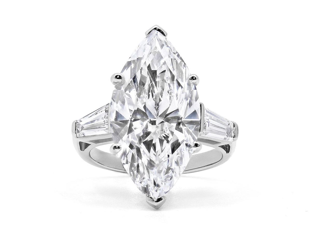 Marquise diamond ring with baguette diamond shoulders in platinum