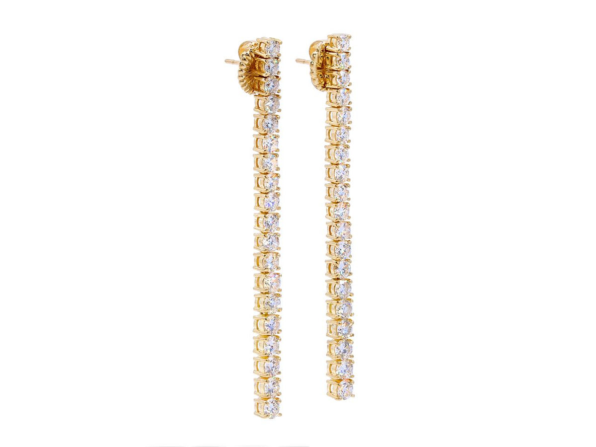 Pair of 18k gold diamond line earrings