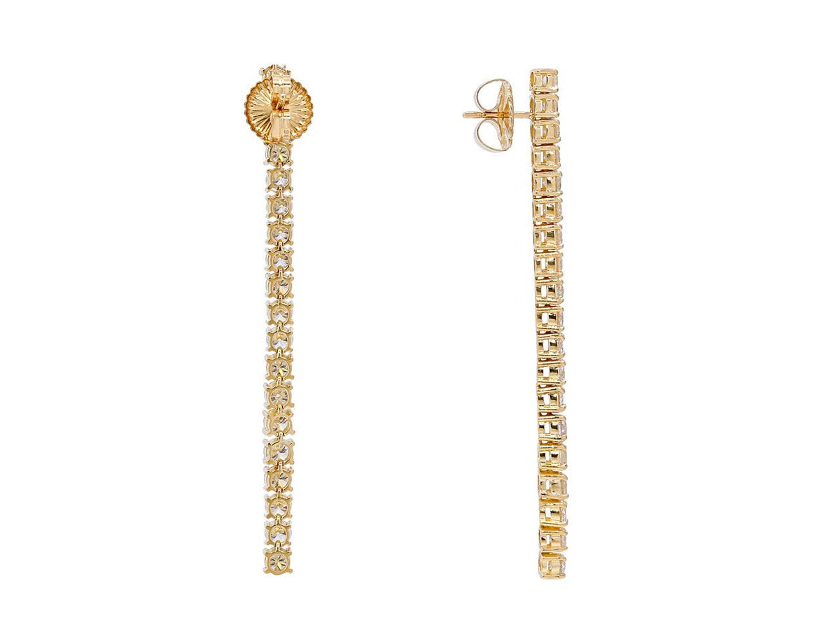 Diamond line earrings in 18K yellow gold shown front and side