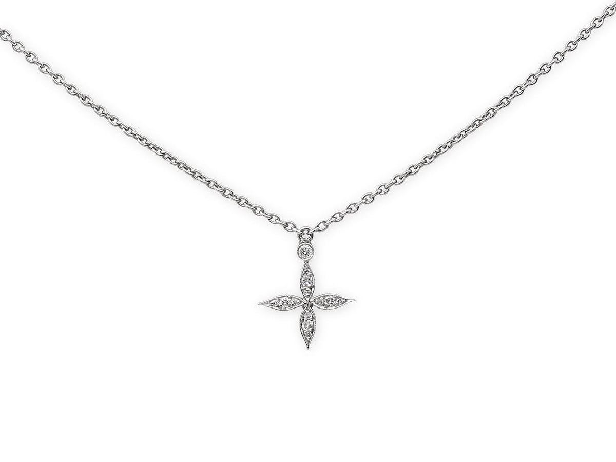Platinum flower pendant necklace with diamond petals