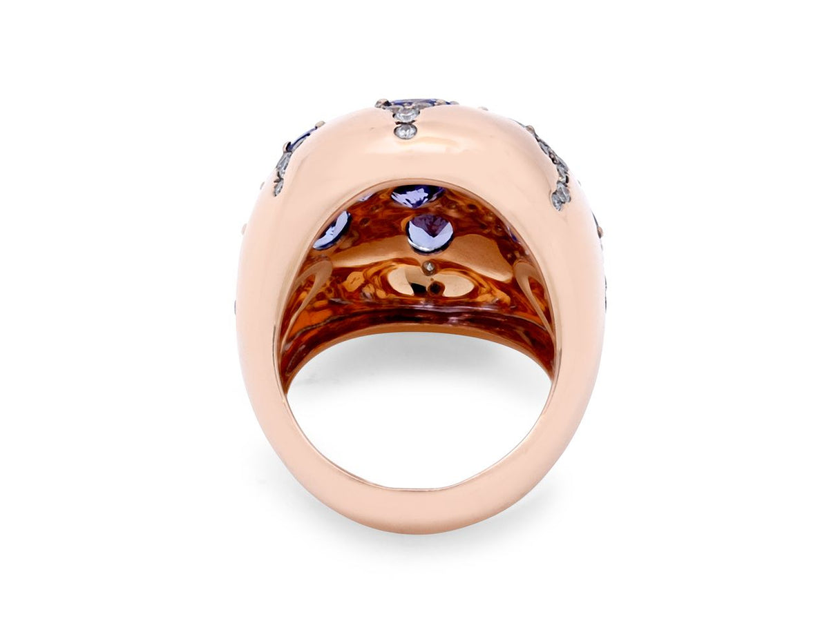Rear view of an 18K rose gold ring with gemstone settings