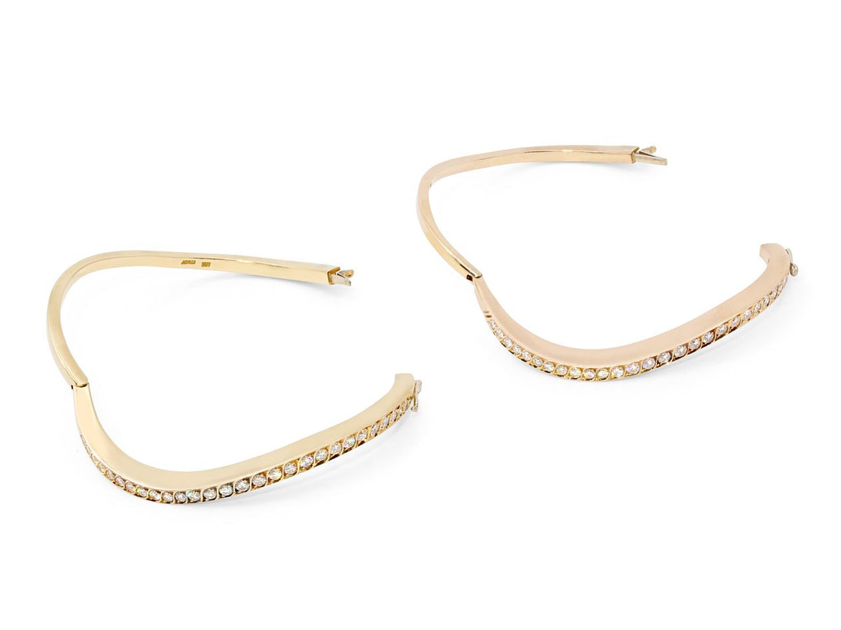 Pair of diamond wave bangles in 18K yellow and rose gold
