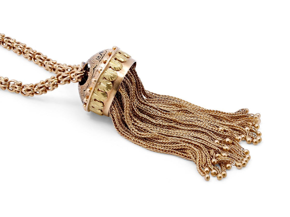 Antique gold necklace with ornate tassel pendant